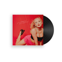 a black lp with a blond woman laying on top of a red background